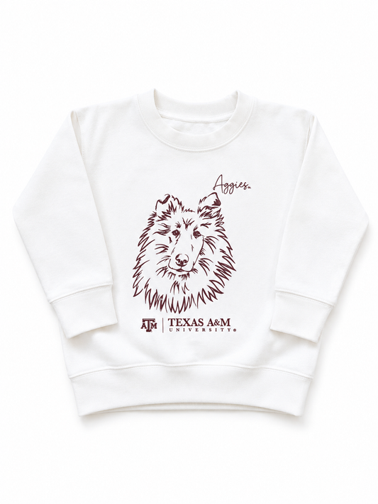 A white long-sleeve crewneck sweatshirt with Texas A&M Reveille dog.